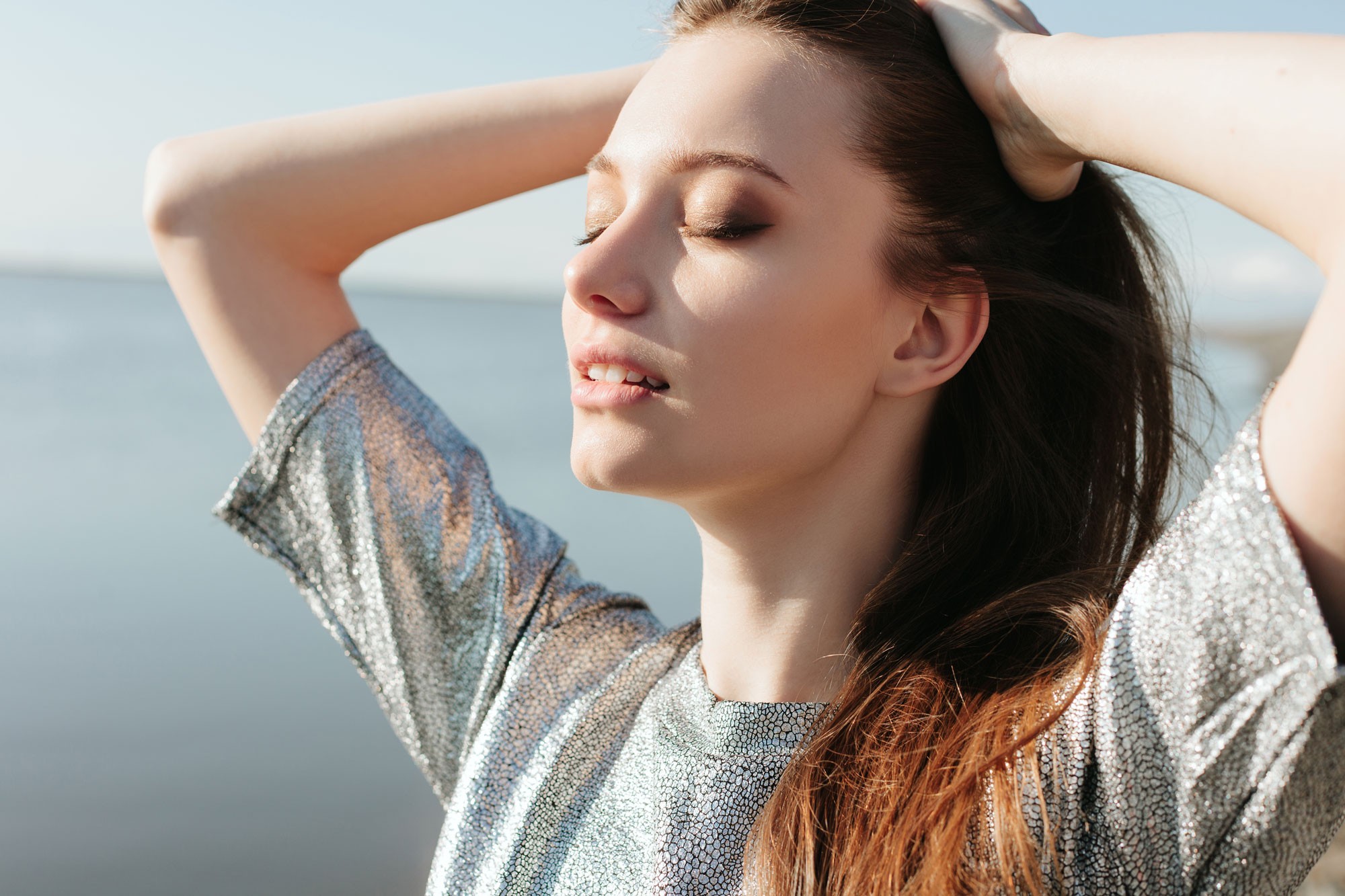 Woman At Peace On Beach